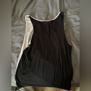 Victoria secret pink tank top size xs fits more like a medium long on me